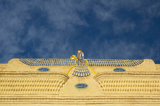 Faravahar, a Zoroastrian emblem, made of tiles and bricks on Yazd fire temple building.  