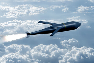 Cruise missile flies in the sky above the clouds, a trace of a missile launch. Concept: war in...