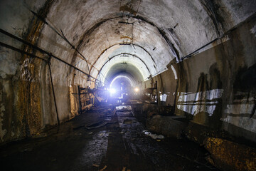 Dark tunnel at old underground bunker