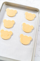 Panda shaped shortbread cookies with chocolate icing