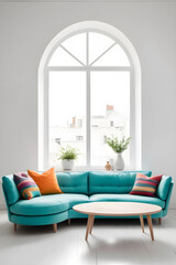 Turquoise sofa with colorful pillows by the window near a white wall with copy space and a round coffee table. Home interior design for a modern living room in minimalism.