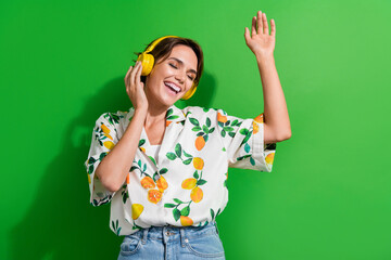 Photo attractive energetic young girl dj listening new release spotify mix music test orange...