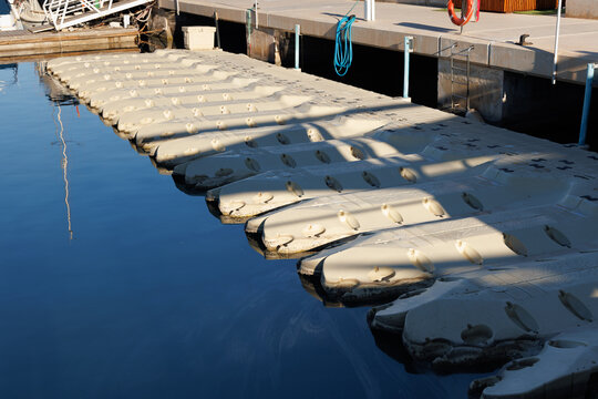 Plastic floating pontoons for jet skis.