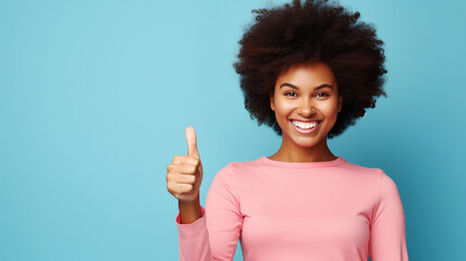 Happy African American woman giving thumbs up on a solid background - Powered by Adobe