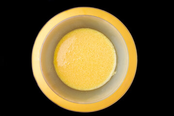 An omelet is ready when raw eggs are stirred together.