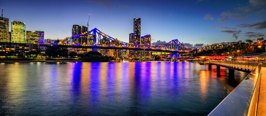 Brisbane city skyline at night with Storey Bridge in foreground