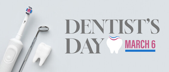 Banner for National Dentist's Day with dental mirror, electric toothbrush and model of tooth