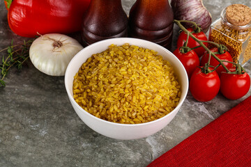 Dry wheat bulgur cereal heap