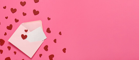 Envelope and many red hearts on pink background with space for text, top view. Valentine's Day...