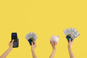 Women with credit cards, payment terminal, dollar banknotes and piggy bank on yellow background