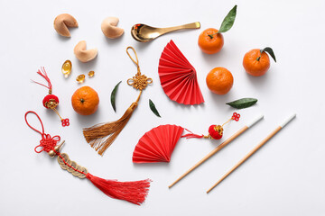 Composition with tangerines and Chinese symbols on white background. New Year celebration