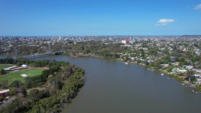 Panoramic Reveal Of Eleanor Schonell Bridge Crossing Brisbane River In Dutton Park, QLD, Australia. aerial panning shot