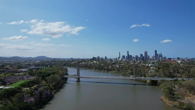 View of Eleanor Schonell Bridge And Brisbane Skyline From Dutton Park In Queensland, Australia. low aerial shot
