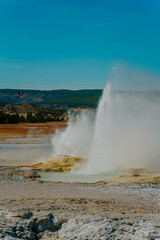 Geyser Eruption Lower Geyser Basin, explosion steam in Yellowstone National Park in Wyoming