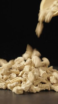 Chinese herb medicine codonopsis root on black background.