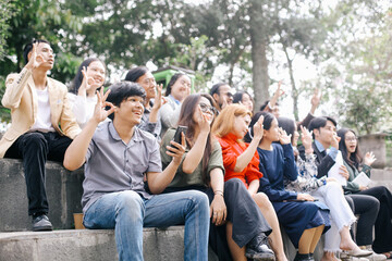Businesspeople showing okay hand sign outside the office