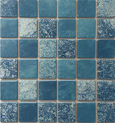 Blue mosaic tile background. stonewall, rock texture. Close-up. Stone background for design. Nature backdrop 
