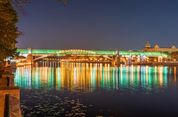 Fototapeta premium Pushkinskiy bridge with night illumination. Bridge to Gorky Park.