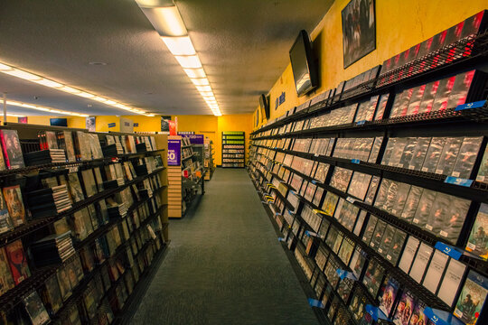 Oregon, USA 3/25/2019: The last Blockbuster store in the USA. The store is shown on the inside and also on the outside from the parking lot. Blockbuster LLC, formerly Blockbuster Entertainment, Inc.