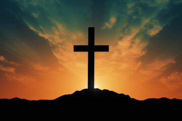 silhouette of Christian cross on mountain background
