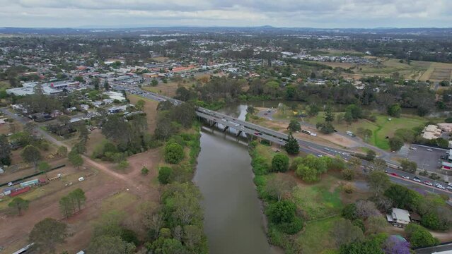 Larry Storey Bridge Crossing Logan River In Waterford, QLD, Australia. aerial pullback, tilt-up shot
