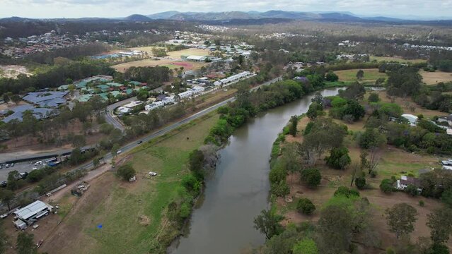 Village Townhouses On The Banks Of Logan River In Waterford, Queensland, Australia. aerial shot