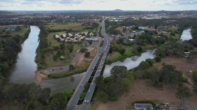 Vehicles On Larry Storey Bridge Spanning Logan River In Waterford, Queensland, Australia. aerial shot