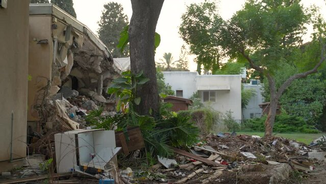 aftermath of the Hamas attack left a completely ruined house in the middle of the kibbutz