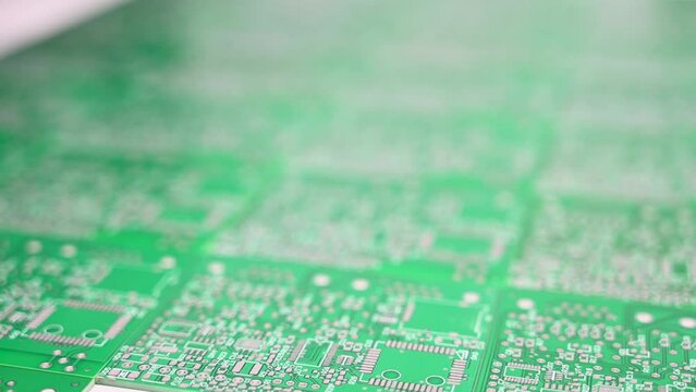 Printed circuit boards with solder applied close-up. Concept of high-precision automatic production of electronic devices and modems