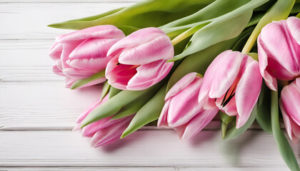 Pink Tulips on white wooden background with copy space