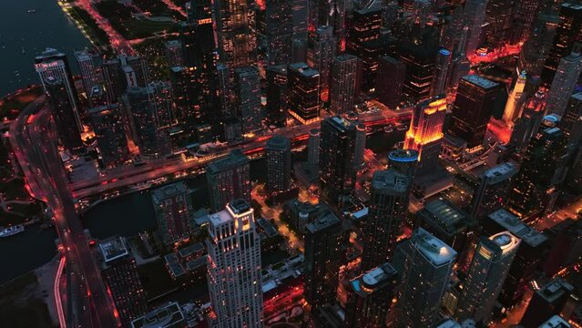 Illuminated city night cityscape Aerial shot in a city Crowded streets and heavy traffic 4K Drone Footage
