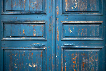 Old historical colorful doors and shutters made of wrought iron and wood. Old historical wooden...