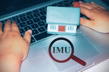 House with a magnifier with the text 