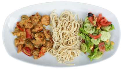 chicken with curry sauce, spaghetti and fresh salad on plate isolated top view