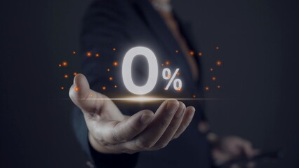 Businessman holding zero percentage on hand with copy space for sale discount promotion for Black Friday and merry Christmas happy new year period.