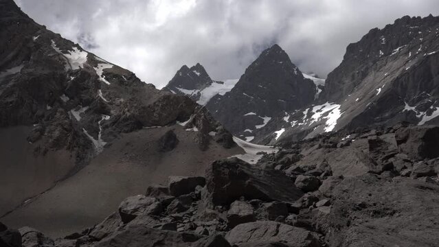 Zoom in view of cerro Tolosa with glacier in Mendoza near limit with Chile in the Andes mountains of Argentina.