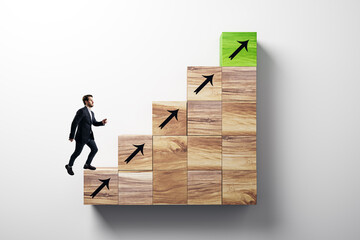 Businessman climbing creative growing wooden ladder with upward arrows on white background. Career growth and success concept.