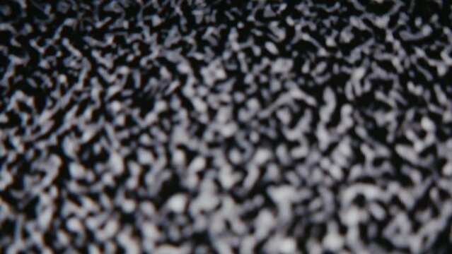 Digital static on a television screen.  Step printed for staccato effect.