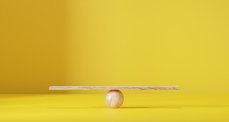 Wooden scales on a yellow background.