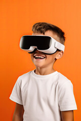 Portrait of a boy in virtual reality glasses on an orange background. Kids T-shirt mockup.