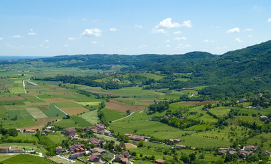plain with the cultivated fields divided into geometric shapes