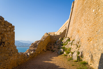 The stone interior of Palamidi fortress , Europe, Greece, Peloponnese, Argolis, Nafplion, Myrto seashore, in summer on a sunny day.