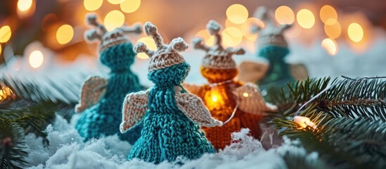 Bright background with knitted Christmas angels.