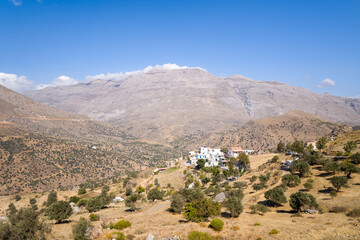 The arid countryside in the south of the island , in Europe, Greece, Crete, towards Preveli, By the Mediterranean sea, in summer, on a sunny day.