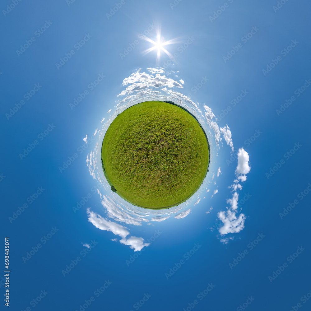 Canvas Prints green tiny planet in evening blue sky with beautiful clouds. transformation of spherical panorama 36