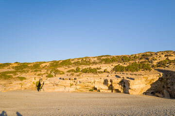 The rocks by Triopetra Beach , in Europe, Greece, Crete, towards Rethymno, By the Mediterranean Sea, in summer, on a sunny day.