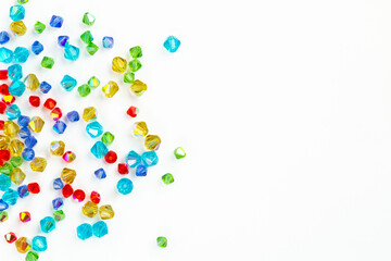 White background with multi-colored beads