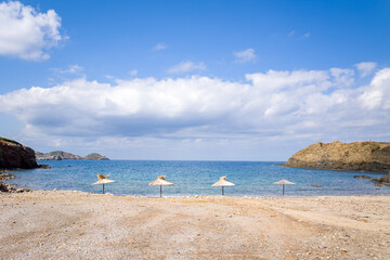 The sandy beach of Beach Good Land , in Europe, Greece, Crete, towards Heraklion, By the Mediterranean Sea, in summer, on a sunny day.