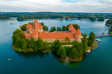 Naklejka na ściany i meble Aerial view of Trakai castle. Medieval gothic Island castle, located in Galve lake. Drone photo from above