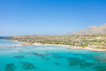 The sandy beach and its heavenly colored water, in Europe, Greece, Crete, Elafonisi, By the Mediterranean Sea, in summer, on a sunny day.